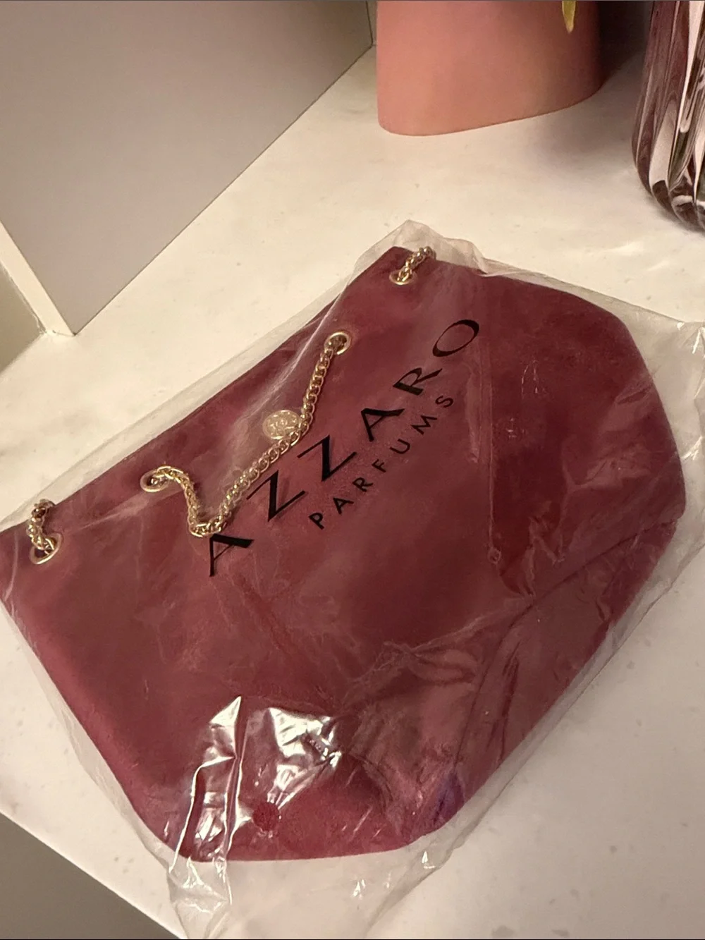 AZZARO Parfums Quilted Cosmetic Tote gold chain in Deep Wine GWP